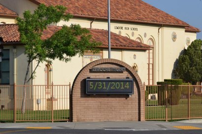 Lemoore police arrest juvenile for bringing a gun on Lemoore; his father later arrested